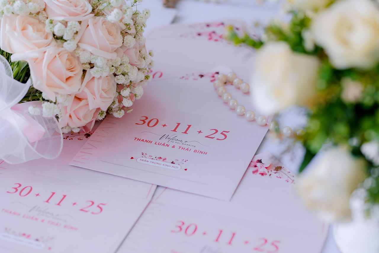 Wedding Stationery — Landing Page Beautiful wedding invitations surrounded by soft floral arrangements, ready for a romantic celebration.